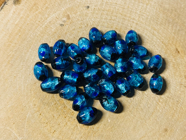 Perles en verre Hotaru d’Okinawa bleues forme olive pour bracelet
