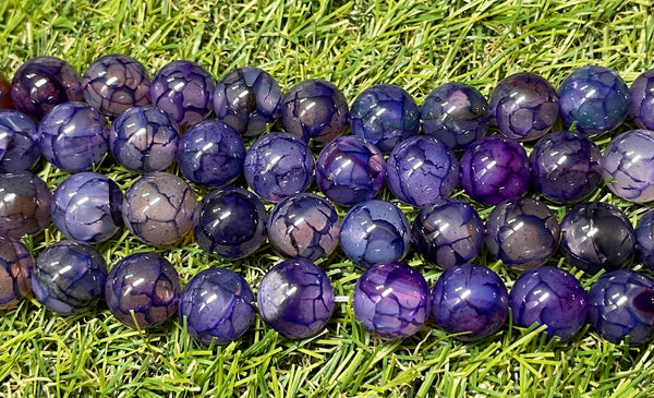 Perles naturelles en Agate veine de dragon violette en 14 mm - Les bijoux de Théa