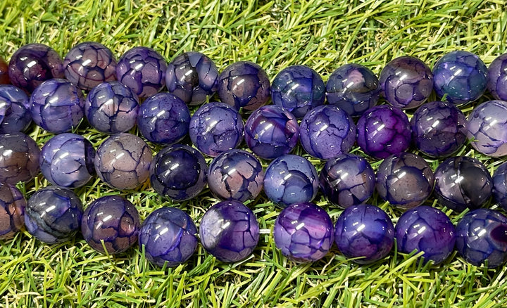 Perles naturelles en Agate veine de dragon violette en 14 mm - Les bijoux de Théa