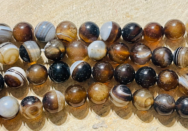 Perles en pierre naturelle en Agate marron noir en 10 mm - les bijoux de Thea 
