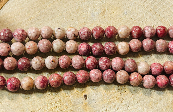 Perles en pierre naturelle en Corail Fossile rose en 8 mm - les bijoux de Thea 