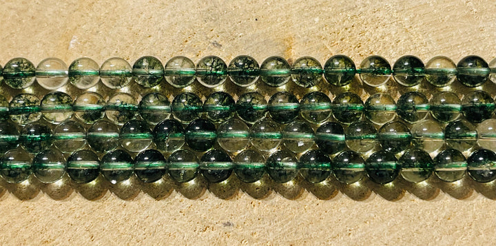 Perles naturelles en Cristal de Roche craquelé vert en 8 mm - les bijoux de Thea 