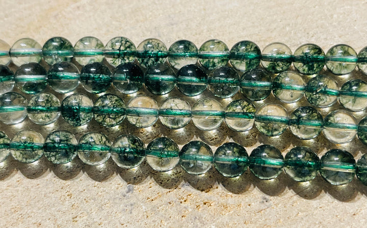 Perles naturelles en Cristal de Roche craquelé vert en 8 mm - les bijoux de Thea 