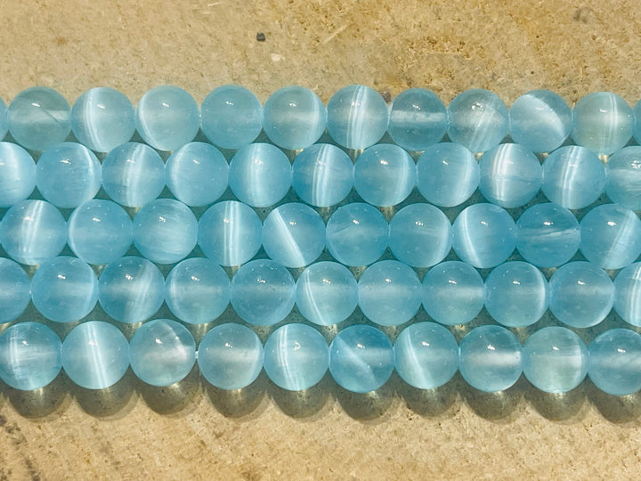 Perles naturelles en Sélénite bleue ciel du Canada en 8 mm - les bijoux de Thea 