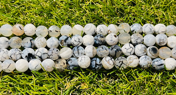 Perles naturelles en Agate veine de dragon facettée en 8 mm