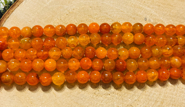 Perles naturelles en Agate veine de dragon orange en 8 mm - Les bijoux de Théa