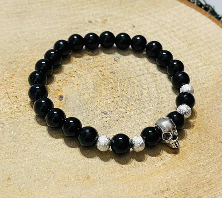 Lot de 5 bracelets en perles noires et tête de mort (34) - les bijoux de Thea 