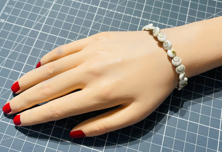 Bracelet en perles naturelles Œil de Sainte Lucie / Shiva 8 mm - les bijoux de Thea 