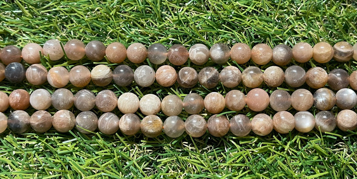 Perles naturelles en Pierre de Lune pêche foncée en 8 mm - Les bijoux de Théa