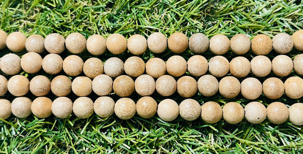 Perles en Bois de Camphre beige en 8 mm