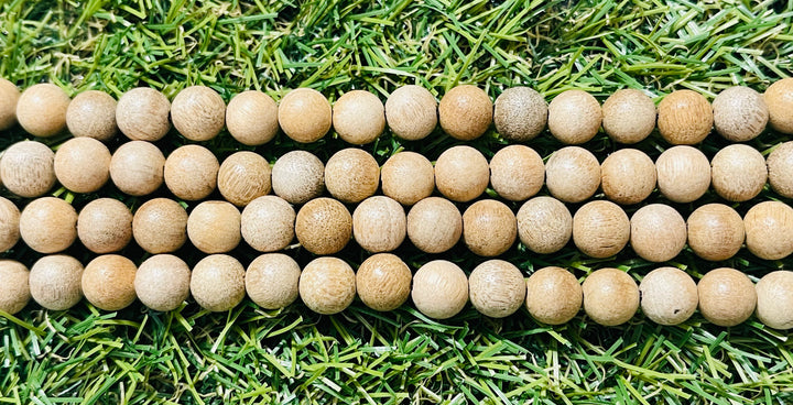 Perles en Bois de Camphre beige en 8 mm - Les bijoux de Théa