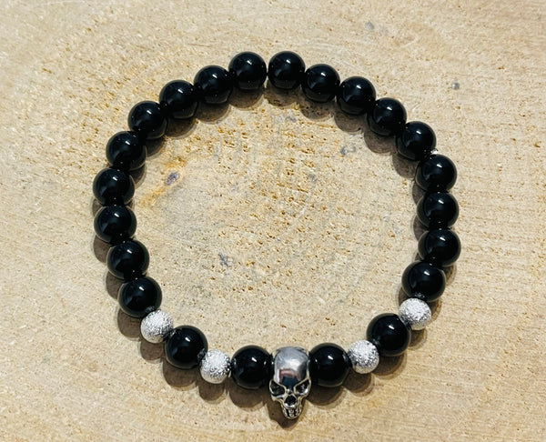 Lot de 5 bracelets en perles noires et tête de mort (34) - les bijoux de Thea 