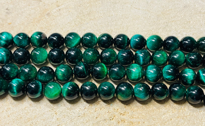 Perles naturelles en Oeil de Tigre vert en 8 mm - Les bijoux de Théa