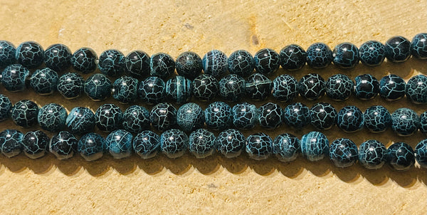 Perles naturelles en Agate bleue foncée craquelée en 8 mm - les bijoux de Thea 