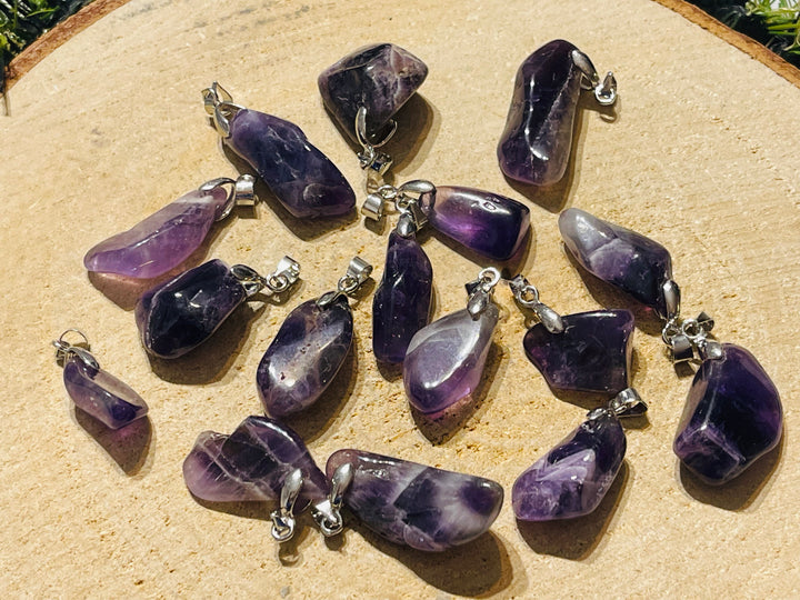 Pendentif en Amethyste de forme pierre roulée - les bijoux de thea 