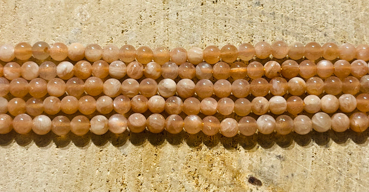 Perles en pierre naturelle en Pierre de Lune pêche en 4 mm - les bijoux de Thea 