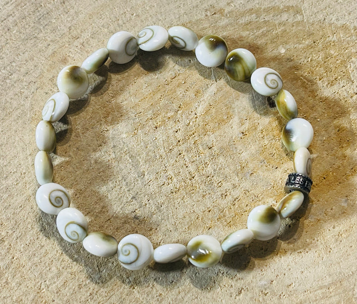 Bracelet en perles naturelles Œil de Sainte Lucie / Shiva 8 mm - les bijoux de Thea 