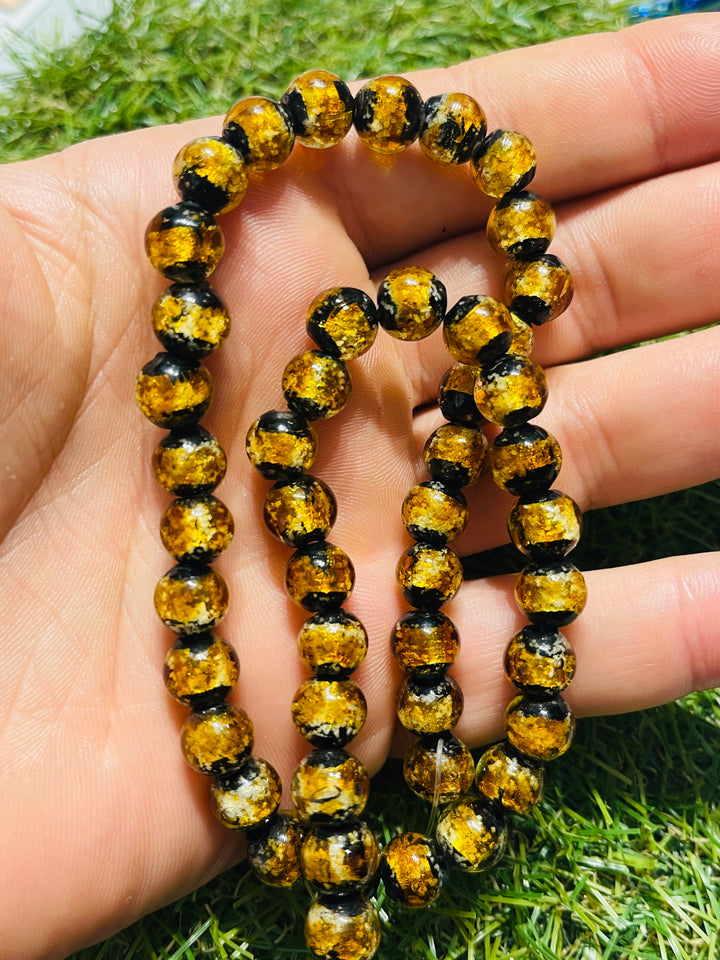 Perles en verre Hotaru d’Okinawa jaunes 8 mm pour bracelet - Les bijoux de Théa