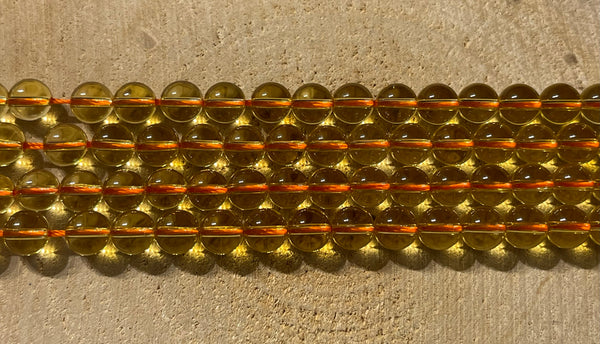 Perles naturelles en Quartz jaune en 8 mm