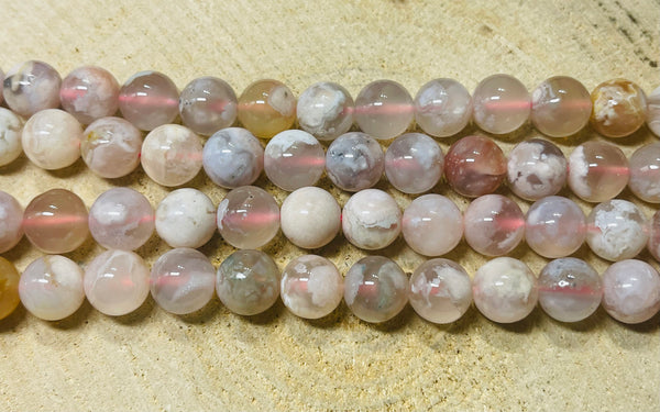 Perles naturelles en Agate Fleurs de cerisier en 10 mm - les bijoux de Thea 