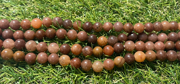 Perles naturelles en Aventurine marron orangée en 8 mm
