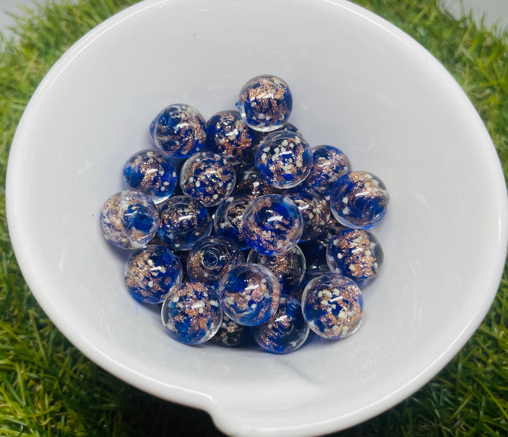 Perles Lumineuses en verre bleues nuit et paillettes dorées en 12 mm pour bracelet - Les bijoux de Théa