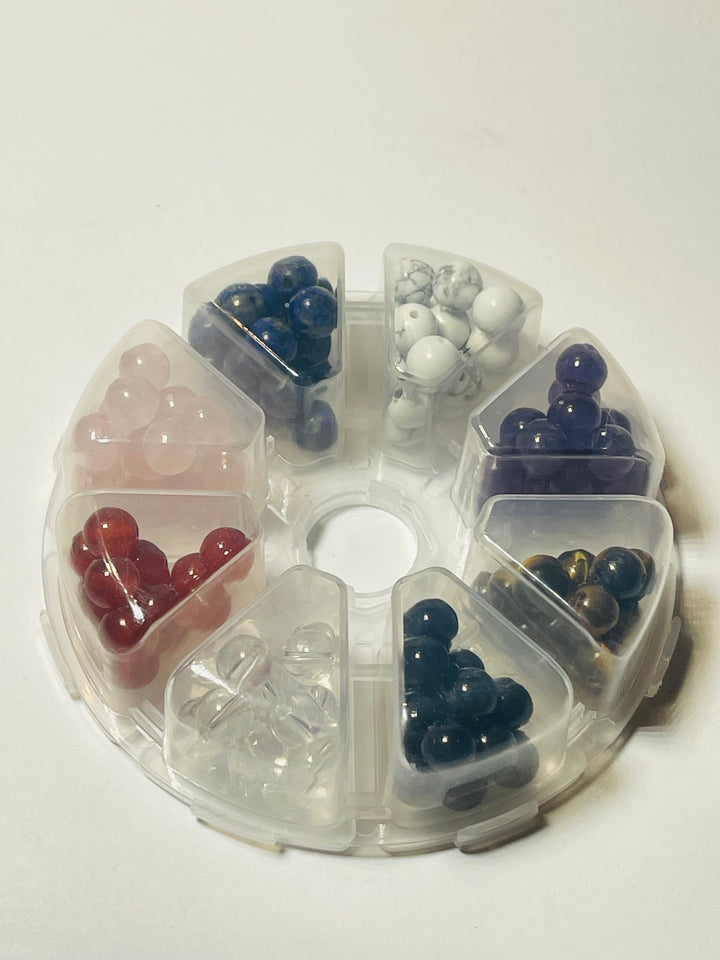 Boite de 120 perles en pierres naturelles en 8 mm, 8 variétés différentes. - Les bijoux de Théa