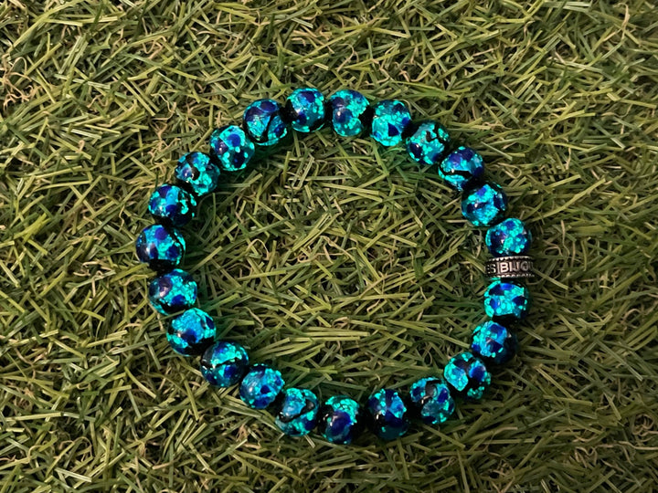 Bracelet en perles Lumineuses bleues en 8 mm - Les bijoux de Théa