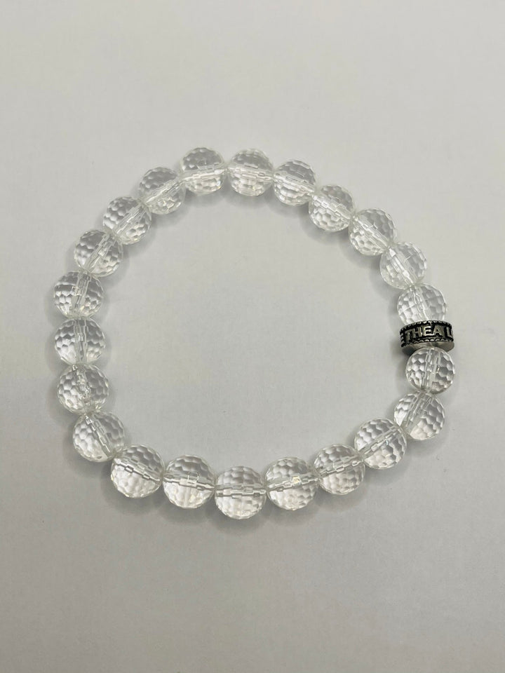Bracelet en perles naturelles 8 mm en Cristal de Roche à facette - Les bijoux de Théa