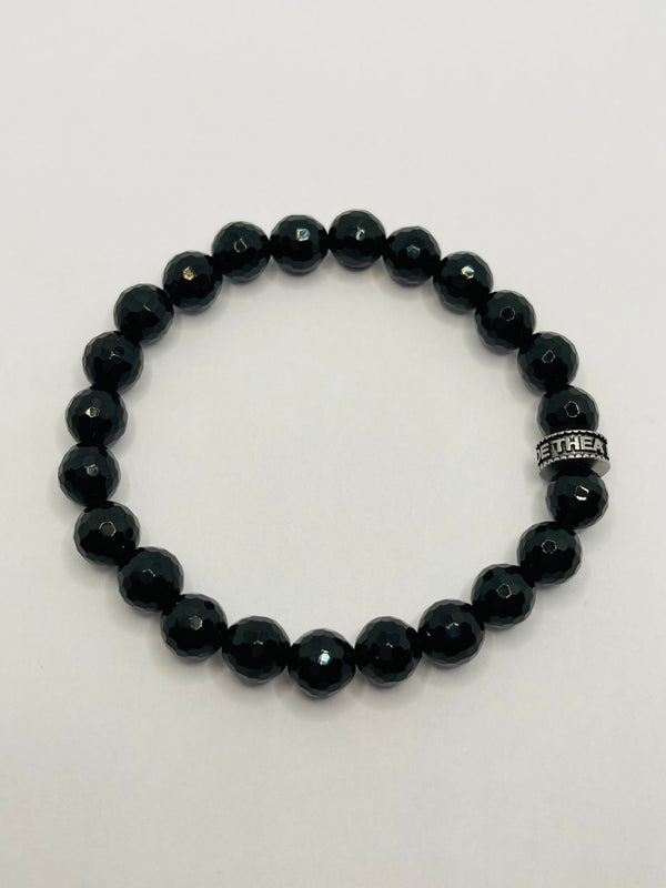 Bracelet en perles naturelles 8 mm en Onyx noir à facette - Les bijoux de Théa