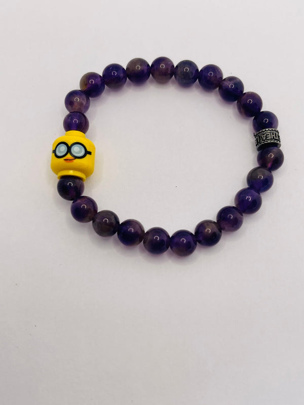 Bracelet pour enfant en perles naturelles 6mm en Améthyste et tête de Lego - Les bijoux de Théa