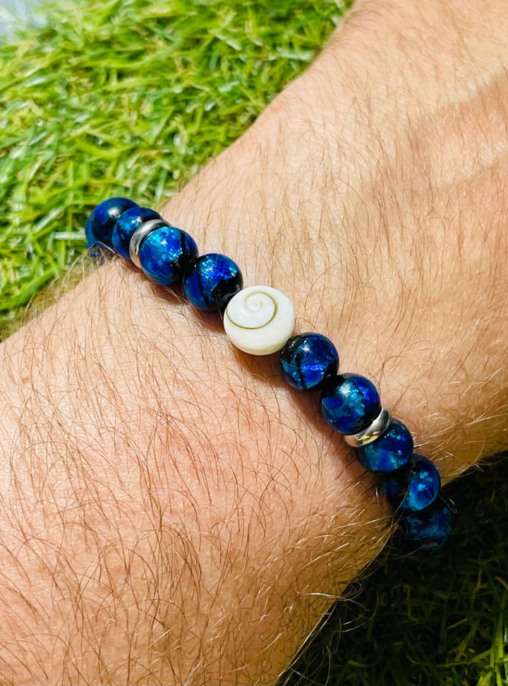 Bracelet "SEA" en perles Lumineuses bleues 8 mm et Oeil de Sainte Lucie / Shiva - Les bijoux de Théa