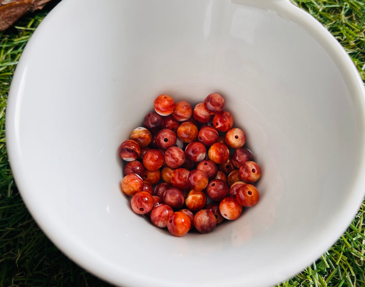 Perles naturelles en Nacre rouge orangé d’huître épineuse en 9 mm (lot de 10) - Les bijoux de Théa