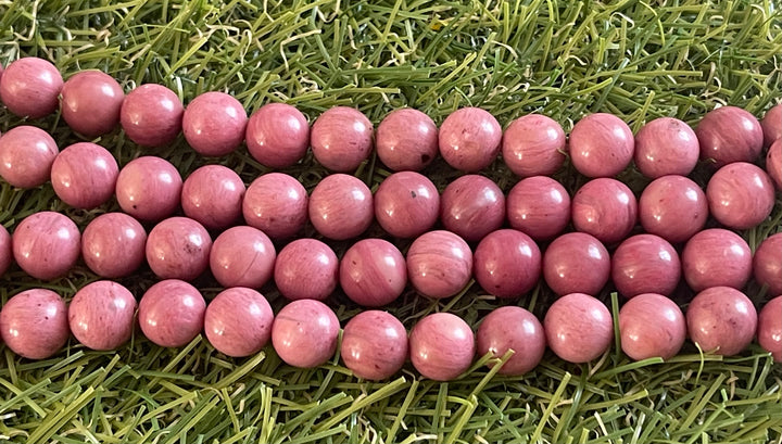 Perles naturelles en Rhodonite foncée en 8 mm - Les bijoux de Théa