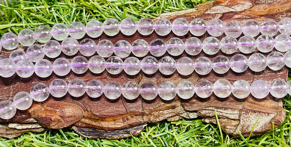 Perles naturelles en Améthyste Lavande en 6 mm - Les bijoux de Théa