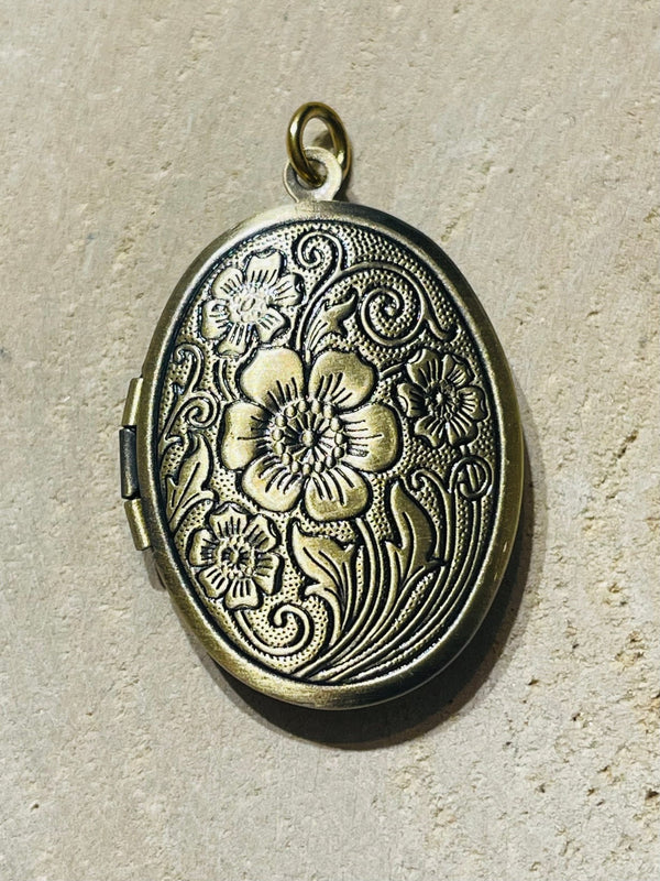 Pendentif double porte photo bronze avec fleur - Les bijoux de Théa