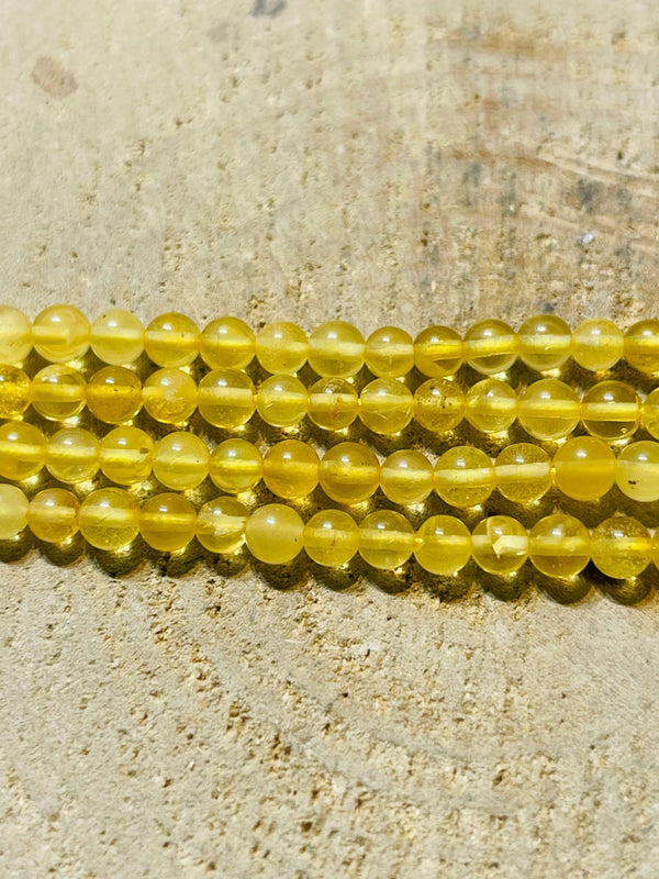 Perles d’Ambre Baltique en 4 mm jaune miel - Les bijoux de Théa