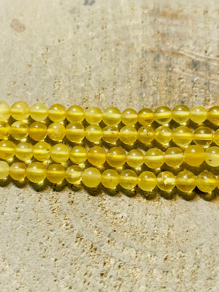 Perles d’Ambre Baltique en 4 mm jaune miel - Les bijoux de Théa