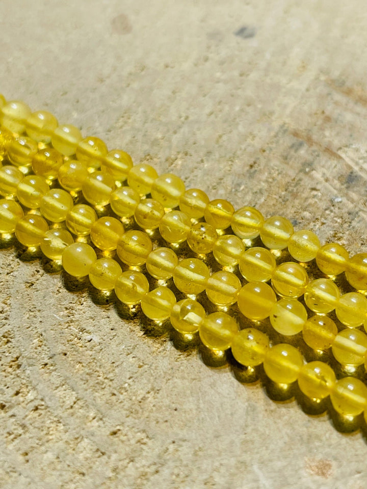 Perles d’Ambre Baltique en 4 mm jaune miel - Les bijoux de Théa