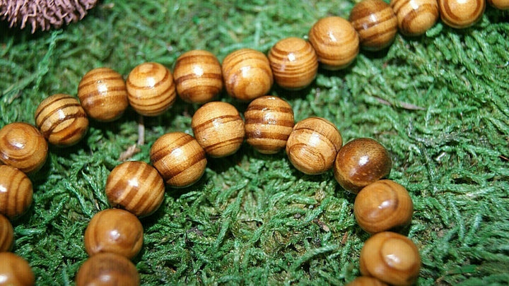 Perles en Bois zèbré en 8 mm - Les bijoux de Théa