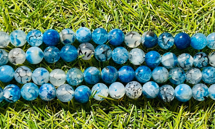 Perles en pierre naturelle en Agate veine de dragon bleue en 8 mm - Les bijoux de Théa