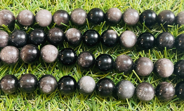 Perles en pierre naturelle en Obsidienne Oeil Céleste argentée grise en 10 mm - Les bijoux de Théa