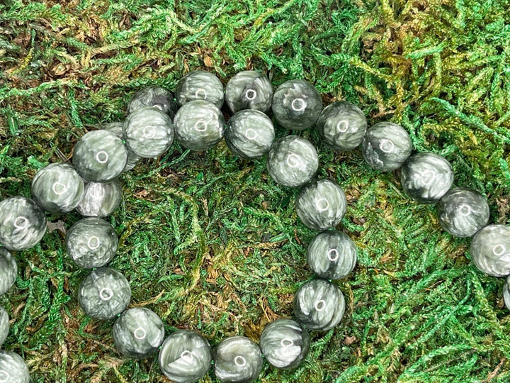 Perles en Séraphinite en 6 mm (lot de 20 perles) - Les bijoux de Théa