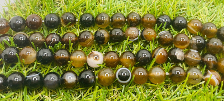 Perles naturelles en Agate marron en 6 mm - Les bijoux de Théa