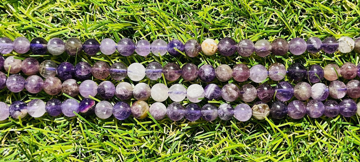 Perles naturelles en Améthyste violette / blanche en 6 mm - Les bijoux de Théa