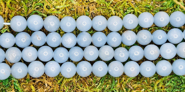 Perles naturelles en Angélite en 8 mm - Les bijoux de Théa