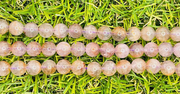 Perles naturelles en Auralite 23 en 6 - 6.5 mm - Les bijoux de Théa