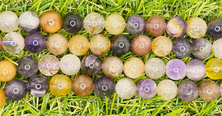 Perles naturelles en Auralite 23 en 8 mm - Les bijoux de Théa