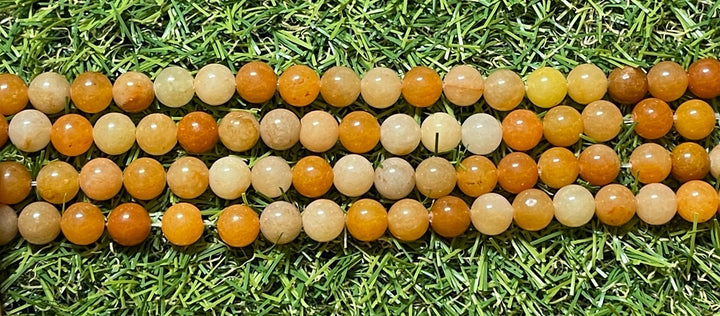 Perles naturelles en Aventurine orange en 6 mm - Les bijoux de Théa