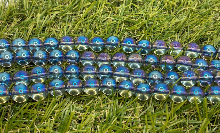 Perles naturelles en Cristal de Roche Aura bleu en 10 mm - Les bijoux de Théa